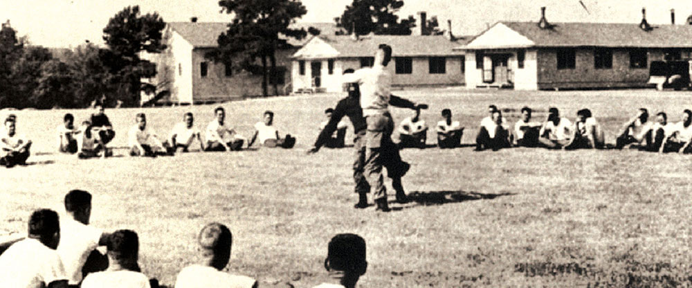 Hand-to-hand combat training on the main parade ground at the Psywar Center, 1954. Under COL Charles H. Karlstad, the training program at the center was quickly brought up to Army Field Forces standards.