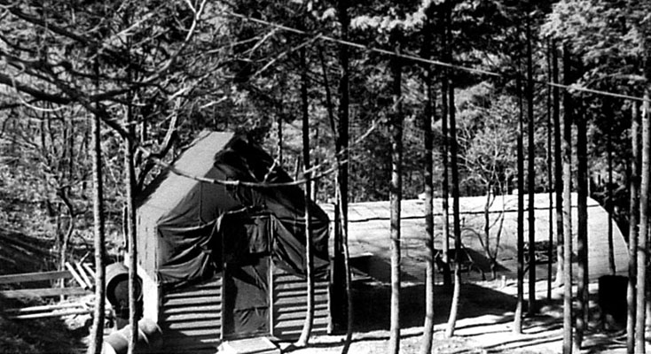 The 4th MRBC Radio Pusan detachment, initially co-located at the Korean radio station compound, lived in ‘Paradise Pines.’ The officers had a tent covered shelter and the soldiers lived in the Quonset hut behind.