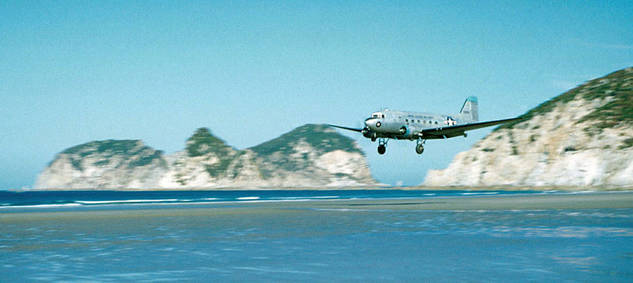U.S. Air Force C-47 carrying supplies for CCRAK landing on Cho-do Island beach.