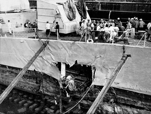 USS Mansfield with the bus-sized mine hole in its bow.