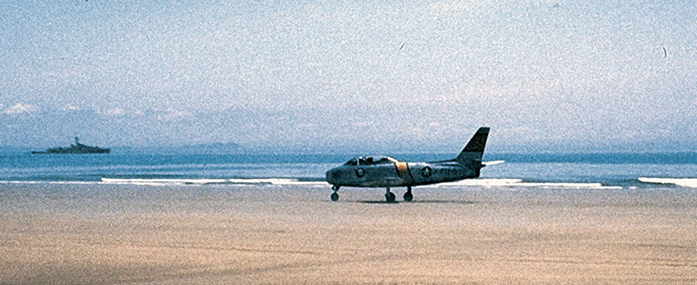 F-86 Sabre fighter made an emergency landing on a flat beach