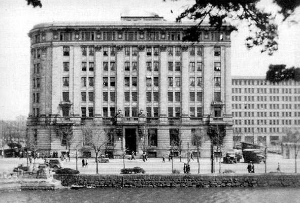 The NYK Shipping Company building, facing the Imperial moat, housed the Allied Translator and Interpreter Section until deactivation in late 1948. It was up the street from the Dai-Ichi building which served as the Far East Command (FEC) headquarters of General Douglas A. MacArthur.