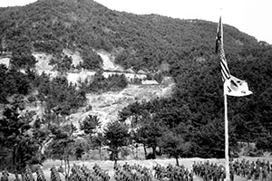The South Korean Minister of Defense addressed and reviewed the 300-man CIA guerrilla force and Special Mission Group (45 personnel) during a visit to the island in late spring 1952.