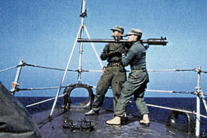 SFC James C. ‘Joe’ Pagnella test fires the 57mm antitank recoilless rifle off the bow of the Wantuck. His assistant gunner was Chou.