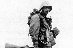 Staff Sergeant (SSG) James C. ‘Joe’ Pagnella, F Company, 2nd Battalion, 187th Airborne Regimental Combat Team (ARCT), walks  away from his first combat jump at Sunchon,  North Korea, on 20 October 1950 (D+10 minutes).