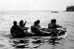 Forcemen training in seven-man rubber boats at Camp Bradford, Virginia. In the invasion of Kiska, the Forcemen used rubber boats to infiltrate the island.