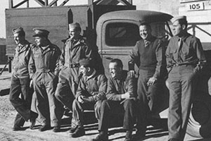 The men of the Photo Detachment at Fort Harrison (l-r): Irwin Cinatl, Frank Lenon, Edward Gielow, Lewis Merriam, Burton Willenzien, Ollie Stripling, and Tom Hope. Missing: Bernie Kassoy (probably taking the picture).