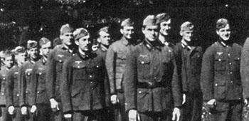 Aaron Bank and his German defectors in German army uniforms for the Iron Cross mission. Bank is at left in the first rank.
