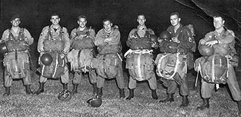 Sergeant First Class Fry, in 1958 with his 10th Special Forces Group team A-3, preparing for a night combat equipment “infiltration” jump. Fry is third from left.