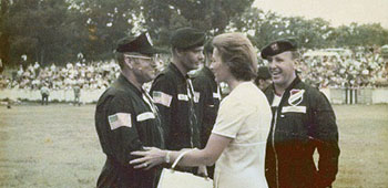 From 1971-1975, Fry served in Uruguay, attending their Military Institute for Superior Studies, and working in the Office of Defense Cooperation there against the Tupamaro urban guerrillas. Here, the First Lady of Uruguay congratulates Fry after a ‘Jumping Ambassadors’ jump at her 1974 Festival of Nations charity event.  