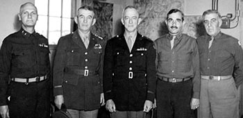 MG Hilldring at Camp Howze, TX, in December 1942. From left to right: Hilldring, Lieutenant General Walter Krueger, MG Courtney H. Hodges, MG Alexander E. Anderson, and John P. Wheeler.