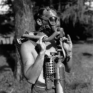 Diver displaying mouth piece of LARU Mark II