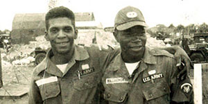 Melvin Morris (L) and a fellow soldier relaxing in this undated photograph taken some time while he was a combat engineer with the 82nd Airborne Division, prior to joining Special Forces.