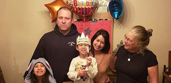 Master Sgt. Earl Plumlee celebrates his son’s birthday party with his family.