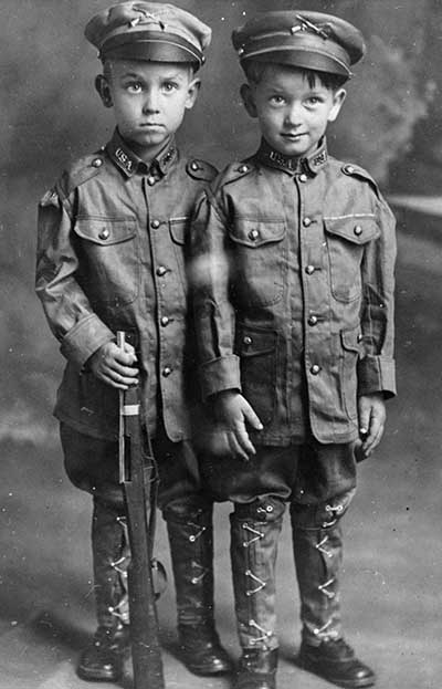 1918: Russell and John Smoller
                as mascots for Company C (Iowa National Guard).